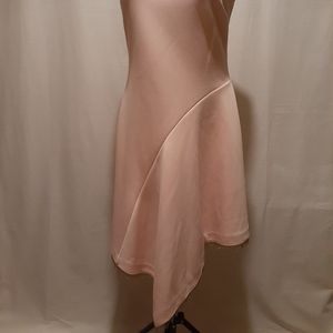 Kind of.  Asymmetrical fit & flare scuba Dress Med